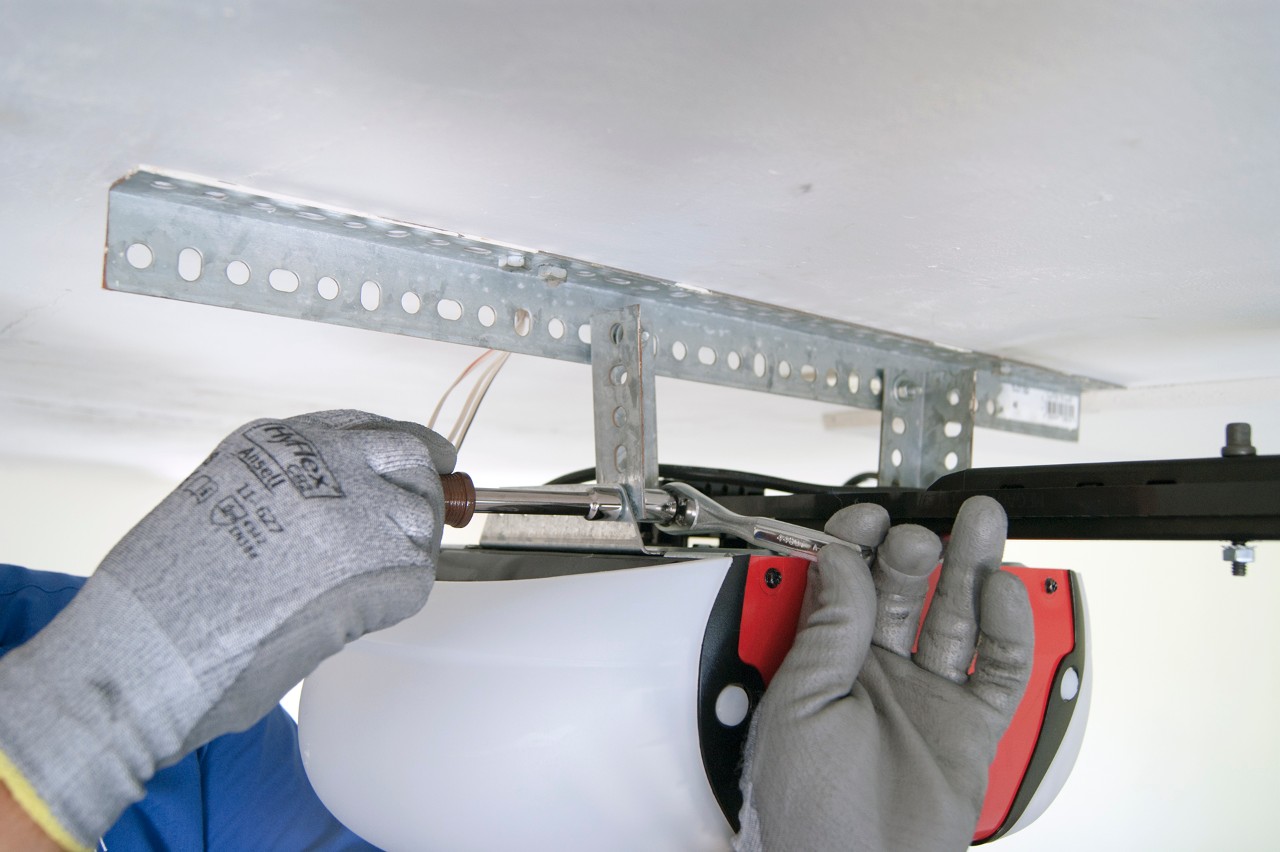 Garage door opener repair technician