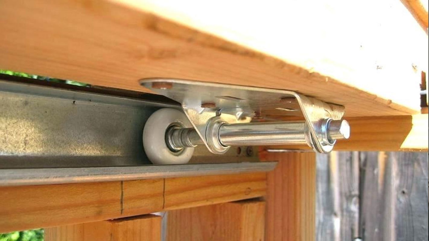 Worn garage door rollers signs